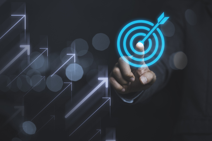 businessman-touching-virtual-dartboard-with-arrow-business-achievement-objective-target-concept