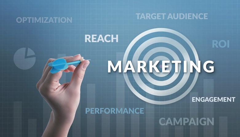 Hand aiming at a target labeled 'Marketing,'